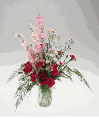 Small arrangement of dainty mixed flowers.