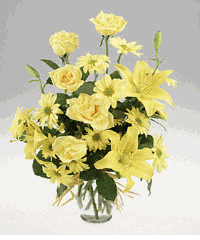Vase arrangement in all yellow flowers.