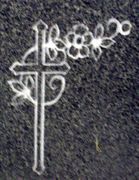 Cemetery Headstone Cross and Rose Sandblasted Design on gray granite