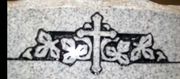 Cemetery Headstone Cross, Leaves, and Border engraved on gray granite