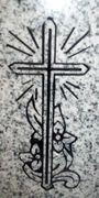 Cemetery Headstone Cross with Floral Engraved Design on Gray Granite
