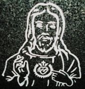 Cemetery Monument Jesus Christ design on dark gray granite Cemetery Monument Jesus Christ design on dark gray granite