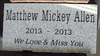 Engraved cemetery grave stone 