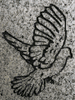 Engraved Dove in Flight Cemetery Headstone Design 203 on Gray Granite