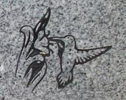 Engraved Hummingbird and Flower Cemetery Headstone Design 244 on Gray Granite
