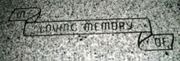 Engraved In Loving Memory Ribbon Cemetery Headstone Design 1690 on Gray Granite