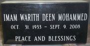 Engraved jet black cemetery memorial marker