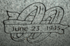 Engraved Rings and Ribbons Cemetery Headstone Design D-63 on Gray Granite