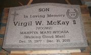 Engraved U3 Stenciled Cross Memorial in Gray Granite