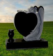 IMG 8 Jet Black Carved Angel with Heart and Vase