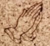 Praying Hands Engraved into a Memorial Praying Hands Engraved into a Memorial