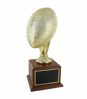 17 INCH GOLD FOOTBALL TROPHY WITH 10-1/2 INCH DIAMETER BALL ON WALNUT BASE