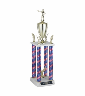 29, 32, 35 INCH FOUR COLUMN STARS AND STRIPES TROPHY WITH CUP, EAGLE TRIMS AND TAKES FIGURE