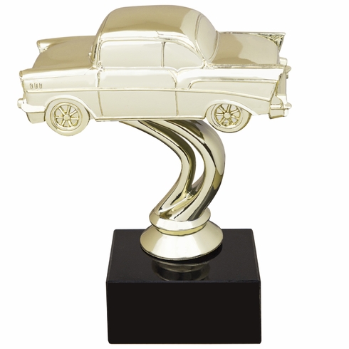 4-1/4 INCH CHEVY GOLD FIGURE ON BLACK MARBLE BASE