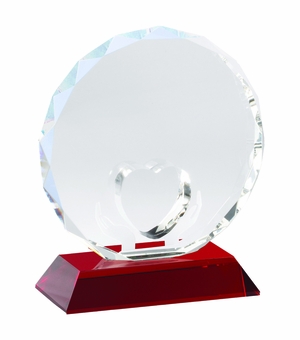 5-3/8 x 4-1/2 INCH OPTICAL CRYSTAL HEART IN HANDS AWARD ON RED BASE