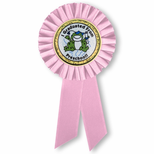 6-1/2 x 3 INCH PINK ROSETTE RIBBON WITH 2 INCH "I GRADUATED FROM PRESCHOOL!" MYLAR INSERT