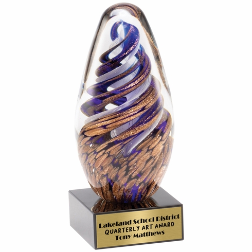 6-3/4 INCH HAND BLOWN BLUE AND GOLD GLASS AWARD WITH SWIRL PATTERN ON A BLACK CRYSTAL BASE