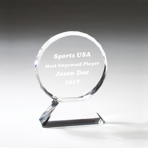 6 INCH CRYSTAL BEVELED AND FACETED CIRCLE ON TRIANGULAR BASE.