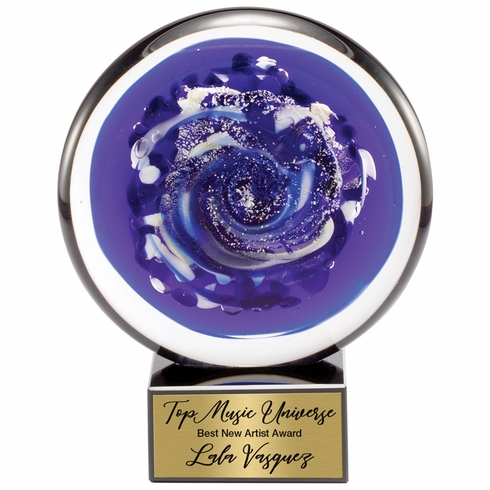 7-1/4 INCH ROUND HAND BLOWN BLUE GLASS AWARD WITH SWIRL PATTERN ON A BLACK CRYSTAL BASE