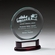 7-3/4 INCH ROUND BEVELED GLASS AWARD ON ROSEWOOD BASE W/ SILVER ENGRAVING PLATE