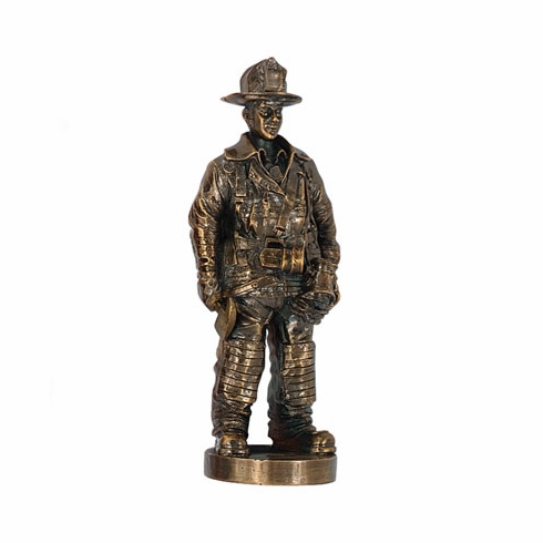 7 INCH FIREMAN FIGURE, ANTIQUE GOLD