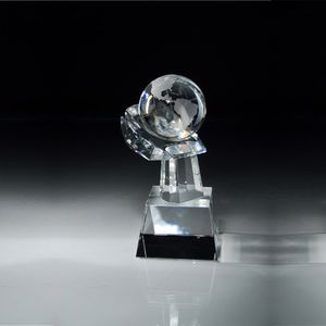 8 1/2"x 3 1/2" CRYSTAL GLOBE IN HAND ON SLANTED BLACK BASE 