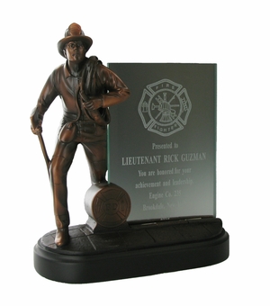 8-1/4 INCH FIREFIGHTER TROPHY FIGURE, ELECTROPLATED IN BRONZE, WITH 4X6 INCH GLASS INSERT