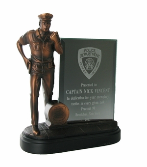 8-1/4 INCH POLICE OFFICER TROPHY, ELECTROPLATED IN BRONZE, WITH 4X6 INCH GLASS INSERT