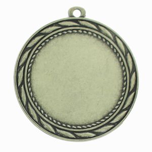 MEDAL FRAME WITH WREATH, HOLDS 2 INCH MEDALLION INSERT. ANTIQUE BRASS 2-3/4 INCH DIAMETER.