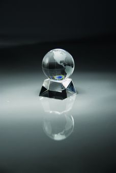 OPTICAL CRYSTAL GLOBE AWARD GIFT BOXED. 2 1/4 INCH GLOBE 2 1/4 INCH X 3 1/2 INCH OVERALL SIZE