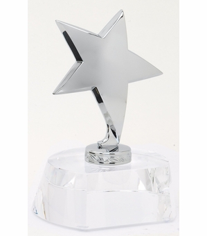 OPTICAL CRYSTAL TROPHY WITH POLISHED METAL SILVER STAR. GIFT BOXED SIZE 4 1/2 INCH X 5 3/4 INCH WITH SILVER PLATE FOR ENGRAVING