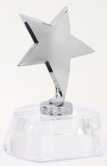 OPTICAL CRYSTAL TROPHY WITH POLISHED METAL SILVER STAR. GIFT BOXED SIZE 4 1/2 INCH X 5 3/4 INCH WITH SILVER PLATE FOR ENGRAVING
