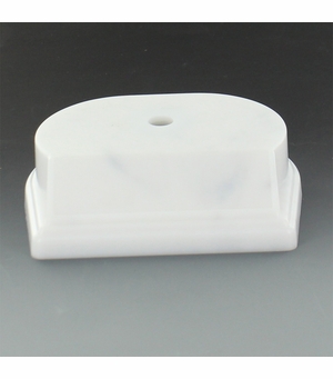 SYNTHETIC MARBLEIZED WHITE TROPHY BASE 4 1/4 INCH X 3 1/2 INCH 1 1/8 INCH. BEVELED EDGE SLANTED FRONT HOLDS 3 INCH X 7/8 INCH PLATE. CENTER HOLE COUNTER SANK.