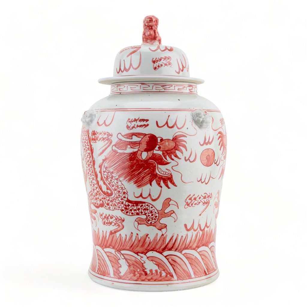 Chinese iron red porcelain dragon lidded jar with foo dog finial