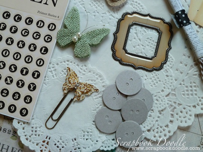 burlap butterfly, chipboard buttons, butterfly clip, epoxy metal frame