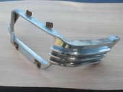 1955 CADILLAC LOWER GRILL EXTENSION GOOD ORIGINAL L.H. (DRIVERS SIDE)