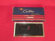 1956, 1957 & 1958 CADILLAC & ELDORADO ACCESSORY LICENSE PLATE FRAME NEW OLD STOCK 