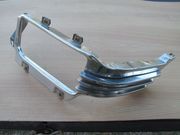 1955 CADILLAC LOWER GRILL EXTENSION GOOD ORIGINAL L.H. DRIVERS SIDE