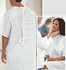 Exam Gown, <b>Color: Snowflake Print, Large, Back Snap Closure</b> 45" with Full , Short Sleeves without Cuff, Reusable, Adult, sold as Each by Fashion Seal Uniforms<br><br><font color="red"><b>BACK TO THE PRODUCT TABLE, <a href="http://www.aaawholesalecompany.com/apparel-gowns-exam-gown.html">CLICK HERE</b></font></a>