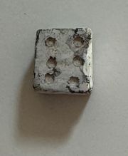 ANCIENT ROME: Northern Spain (late 1st Century CE) Small game die (lead, 29.71g). 