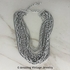 10 Strand Silvertone Necklace