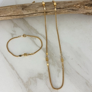 CEL Goldtone Necklace and Bracelet Set