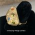 Goldtone Dome Ring with Multicolored Rhinestones Goldtone Dome Ring with Multicolored Rhinestones