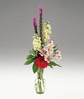A small vase of blossoms Secretaries