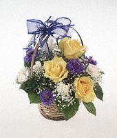 An arrangement for a baby boy in a basket.