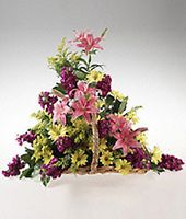 Fireside basket of assorted flowers.