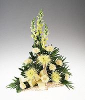 Fireside basket of yellow flowers.