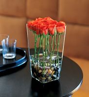 Orange Roses with River Rocks