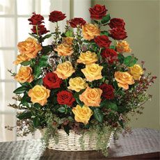 Red, Orange Roses and Red Huckleberry Arrangement