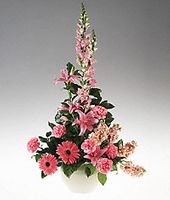 Vase arrangement of pink and peach flowers sympathy
